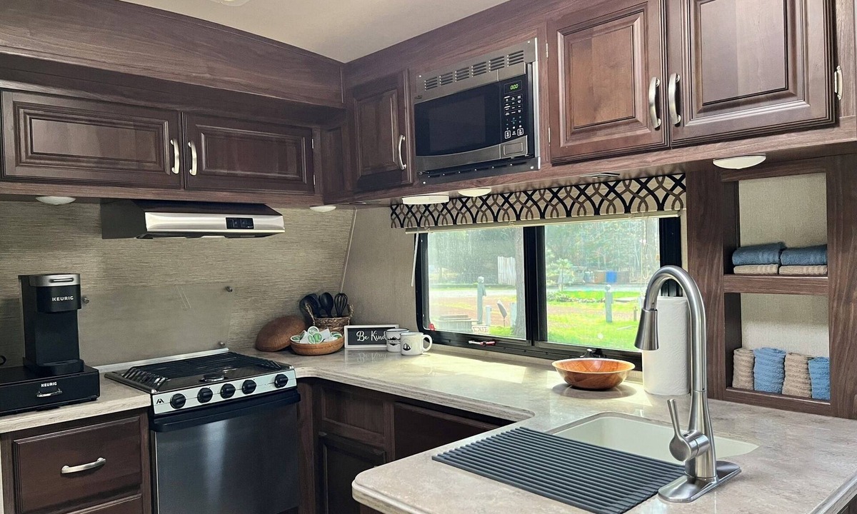 Weed House | Fully Equipped Travel Trailer in beautiful campground setting.