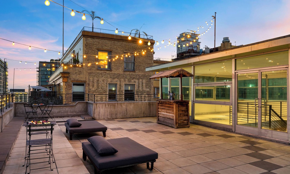 Historic Core House | Industrial-Chic DTLA Loft with Rooftop & City Views | Skyline Lofts by AvantStay