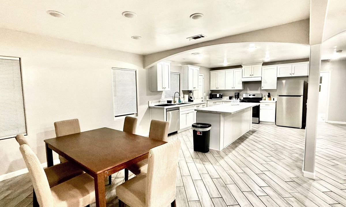 Baker Street House | Spacious 4-bedroom house in charming Bakersfield with AC. 4 queen & 3 twin beds.