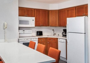 Family fun in Palm Springs in this resort 2BD condo with resort amenities including kids pool