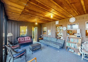 Rustic, lakefront cabin with private dock, beach, screened porch & great view