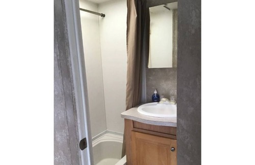Clear Lake House | "Blue Gill Bobber" Roomy Travel Trailer slide out