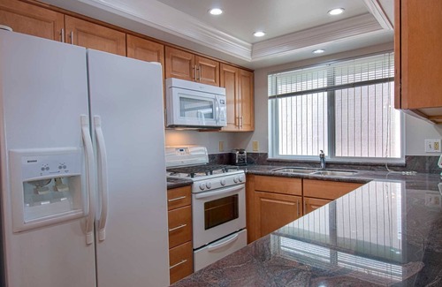 Newport Beach Condo | Bright and Cheery and Green.a beautiful lower unit with lots of personality!