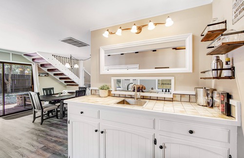 Woodlands Cabin | Classy home with hot tub, tiered decks, firepit, fenced yard & 2 dogs welcome