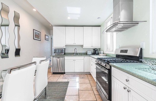 West Newport Condo | Cool Coastal Tri-Level Condo with Ocean Views! Right Side