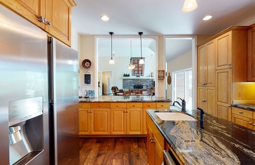 Twin Peaks House | Custom timberline lodge near lake with fireplaces, decks, & pool table