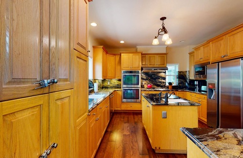 Twin Peaks House | Custom timberline lodge near lake with fireplaces, decks, & pool table