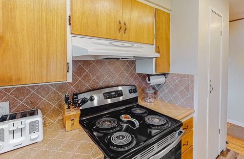 Bass Lake House | Dog-friendly home with boat slip, lake views, multiple decks, yard & WiFi