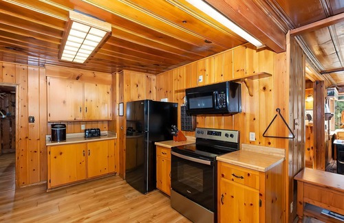 Fawnskin Cabin | Eagles Nest North by Destination Big Bear : Lake Views! Hot Tub! Internet! Cable TV! Historic Features! Huge Deck!