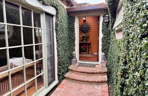 North of Wilshire House | New listing! 3 bd Spanish gem in Brentwood with courtyards & front/back yards.