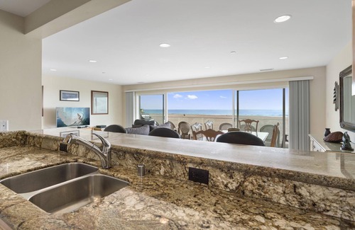 Balboa Peninsula Condo | Stay on the Oceanfront | Coveted Pier-to-Pier Location | Walk to it All (upper level unit)