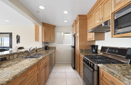 Balboa Peninsula Condo | Stay on the Oceanfront | Coveted Pier-to-Pier Location | Walk to it All (upper level unit)