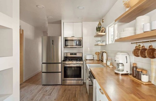 Big Bear City House | Terra Cottage MidCentury Modern A Frame Spa
