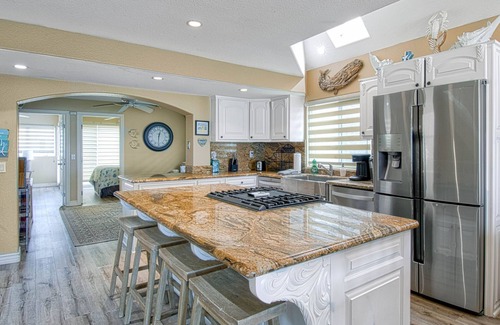 Balboa Peninsula House | Three stories of WOW await you! This spectacular private home is one of a kind!