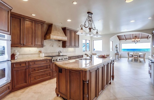 Beach Barber Tract House | ULTRA RARE ~100' Sand Frontage * Direct Beach Access * Convenient Single Level Estate * Prestigious Beach Barber Tract Estate