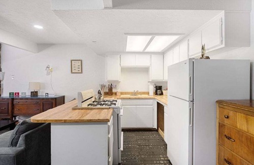 The Village Hotel | Village Suites Inn. Brown Bear, Perfect Location in the Village, fully equipped upstairs unit.
