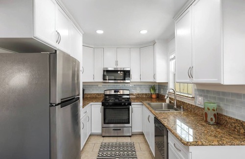 Norwalk House | 2 Homes in One! 2 Kitchens Huge Outdoor Retreat