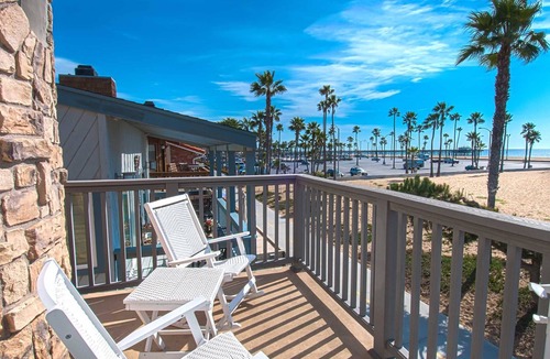Balboa Peninsula Condo | A beach beauty, this exceptional upper unit is beaming with Balboa beach charm!