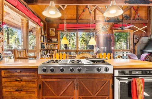 Groveland Cabin | Adventurer's retreat with a pizza oven, wood-burning fireplace, and large deck
