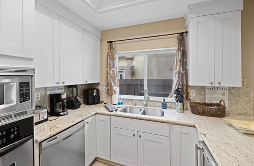 Huntington Beach House | Amazing location partial ocean view w/AC steps to sand, main St. pier & shops.