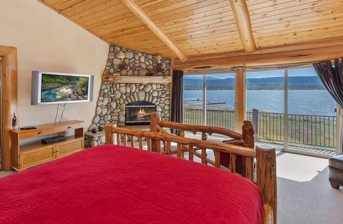 Fawnskin Cabin | Beautiful lakefront estate, hot tub, 180-degree views, game room, and BBQ grill!