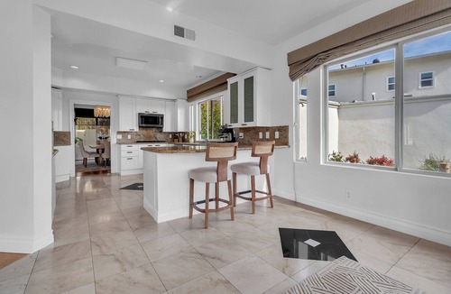 Bel Air House | Bel Air Tennis Villa offers serene canyon views and glimpses of the ocean.