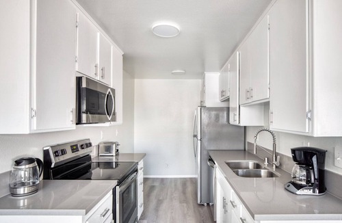 Beverly Grove Apartment | Bright Fairfax 2BR w/Pool, near WF + TJ, Melrose shopping, by Blueground