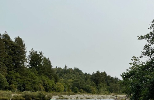 Crescent City House | Bright, open concept, family friendly house, private sandy beach on the river