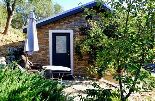 Midpines Cabin | Charming stone clad cabin with views off Highway 140 towards Yosemite
