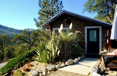Midpines Cabin | Charming stone clad cabin with views off Highway 140 towards Yosemite
