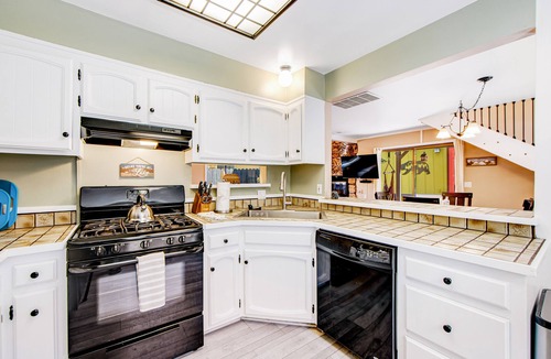 Woodlands Cabin | Classy home with hot tub, tiered decks, firepit, fenced yard & 2 dogs welcome