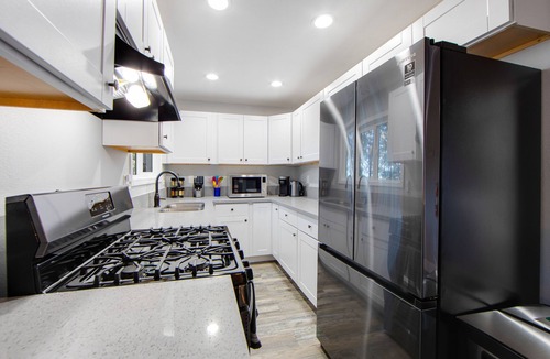 Arrowhead Villas House | Colorful home with washer/dryer, AC & wood-burning fireplace in a lovely setting