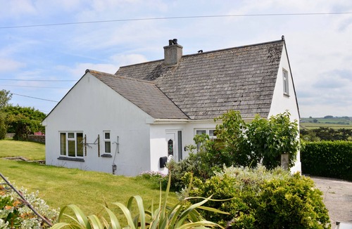 Trebetherick House | Comfortable family house, open plan kitchen/diner, sitting room, wood burner.