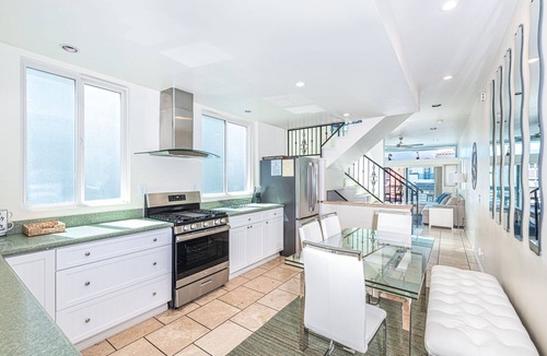 West Newport Condo | Cool Coastal Tri-Level Condo with Ocean Views! Right Side