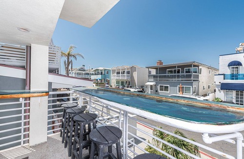 West Newport Condo | Cool Coastal Tri-Level Condo with Ocean Views! Right Side