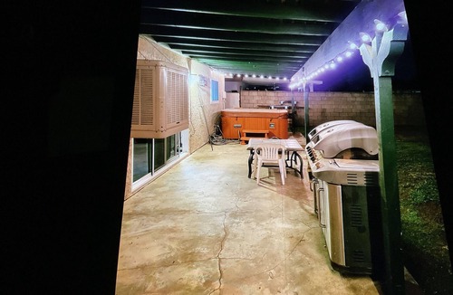Lancaster House | Cozy 4-bedroom house has WiFi and AC in superb Lancaster, a game room & hot tub.