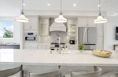 Beach Barber Tract House | Designer Luxury Coastal Home with Panoramic Ocean Views, Rooftop Deck, & Fire Pit