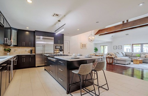 Sherman Oaks House | Exquisite Oasis Universal Pool slide laundry