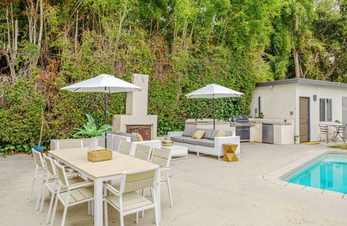 Sherman Oaks House | Exquisite Oasis Universal Pool slide laundry