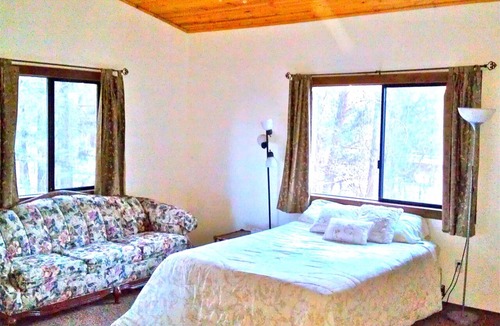 Woodlands House | FIND TRUE SECLUSION IN OUR PEACEFUL CHALET. 5 ACRES, TRAILS, TREES & SPA
