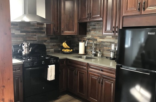 Tarzana House | Gated Guesthouse with Tennis Court, EV charging outlet.