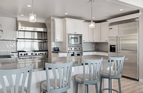Oxnard Shores House | Gorgeous waterfront home with a private hot tub, gas fireplace, & beach access