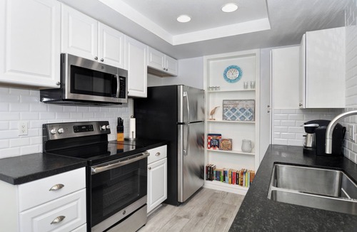 Del Obispo Condo | Harbor Cove-Pool View with Creek! Walk to Beach & Harbor! Lower Unit-No Stairs!