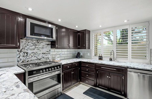 Fresno House | Hot Tub, Game Room - 3 Bed: 2 Bath near Fig Garden Loop!