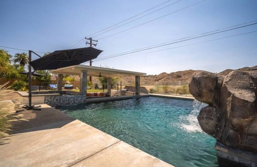 Cathedral City Cove House | Huge Home: Pool, Grotto, Water Slide, Swim Up Bar, Hot Tub, Fire Pit, Game Room