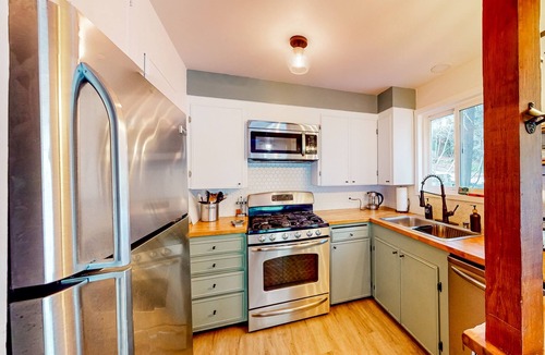 Arrowhead Villas House | Idyllic lake home with firepit, large deck, & games - near skiing, dog-friendly