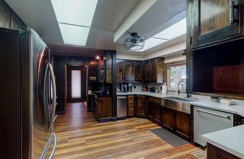 Bass Lake House | Lakefront home w/private boat dock, hot tub, gas grill, buoy, & wood fireplace