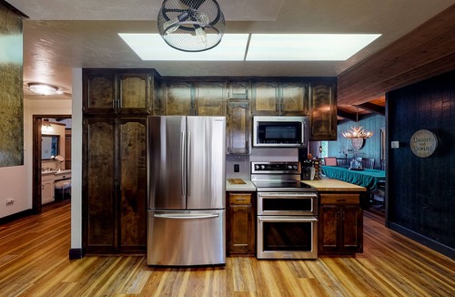 Bass Lake House | Lakefront home w/private boat dock, hot tub, gas grill, buoy, & wood fireplace