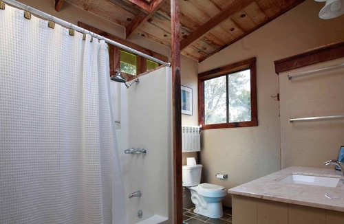 Carmel Highlands Apartment | LARGE GLASS WINDOWS OPEN TO VIEW OF DEEP CANYONs AND OCEAN