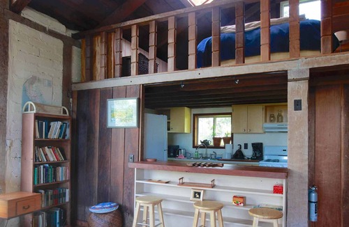 Carmel Highlands Apartment | LARGE GLASS WINDOWS OPEN TO VIEW OF DEEP CANYONs AND OCEAN